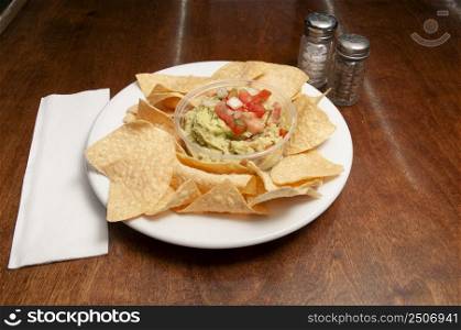 Authentic tex mex mexican cuisine known as guacamole and chips