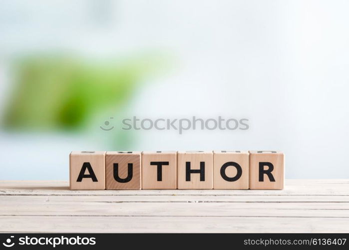 Author sign made of letters on a wooden desk