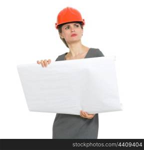 Authoritative architect woman with flipchart looking into distance
