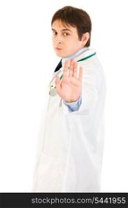 Authoritative medical doctor showing stop gesture isolated on white&#xA;