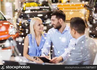 auto business, sale and people concept - happy couple with dealer buying car in auto show or salon over snow effect