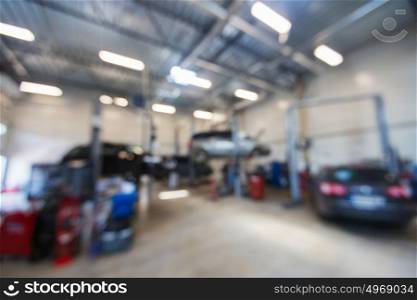 auto service and maintenance concept - car shop or repair station bokeh. car service station bokeh