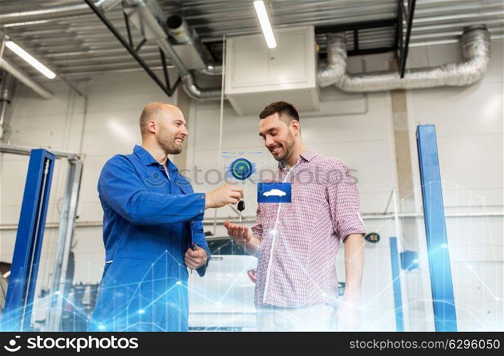 auto service, repair, maintenance and people concept - mechanic with clipboard giving key to happy smiling man or owner at car shop. auto mechanic giving key to man at car shop