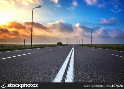 Autobahn. an empty flat road at dawn
