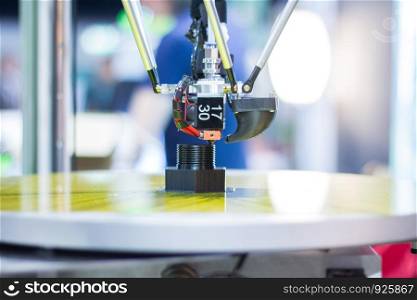 Automatic 3d printer performs a three-dimensional product creation, close-up