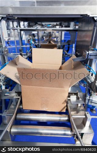 Automatic cardboard box erector machine