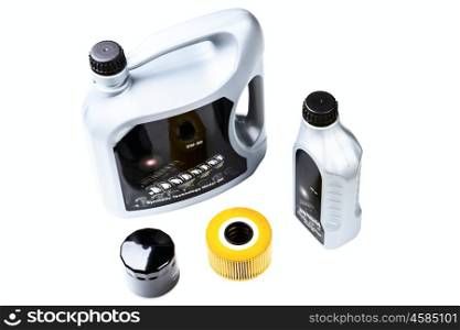 Automobile oil and oil filters isolated on a white background
