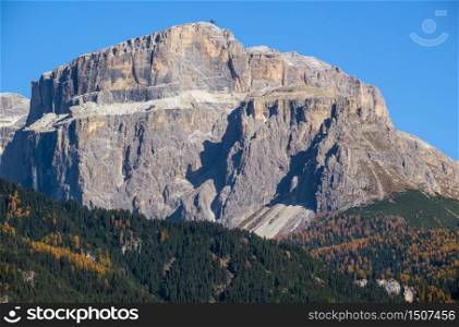 Autumn alpine Dolomites scene, Mazzin, Trentino, Sudtirol, Italy. Peaceful rocky mountain tops view.
