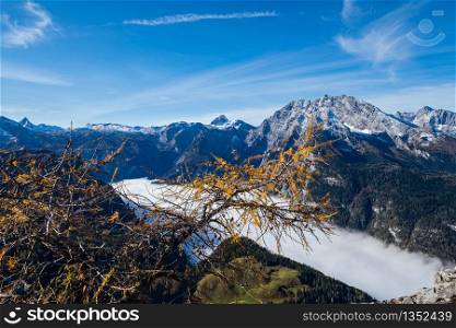Autumn Alps mountain misty morning view from Jenner Viewing Platform, Schonau am Konigssee, Berchtesgaden national park, Bavaria, Germany. Picturesque traveling, seasonal and nature beauty scene.