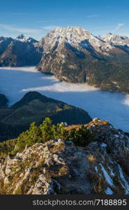 Autumn Alps mountain misty morning view from Jenner Viewing Platform, Schonau am Konigssee, Berchtesgaden national park, Bavaria, Germany. Picturesque traveling, seasonal and nature beauty scene.