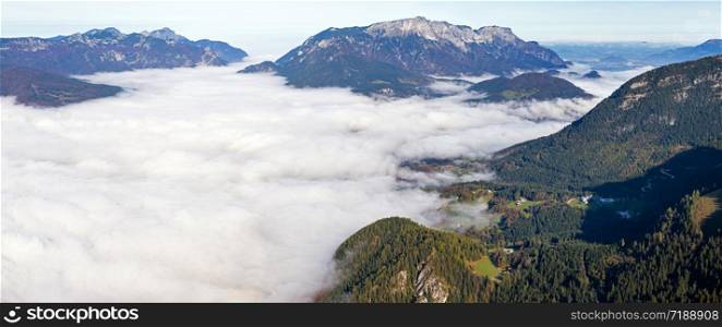 Autumn Alps mountain misty morning view from Jenner Viewing Platform, Schonau am Konigssee, Berchtesgaden national park, Bavaria, Germany. Picturesque traveling, seasonal and nature beauty scene.