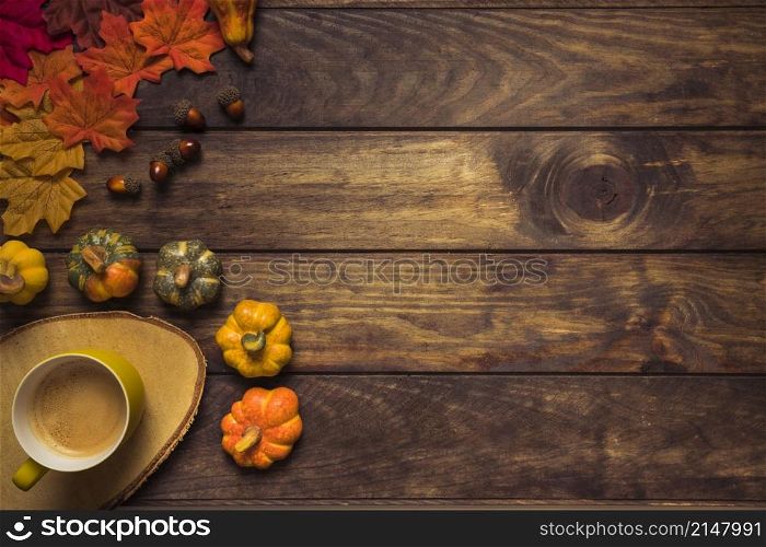 autumn arrangement with leaves hot beverage