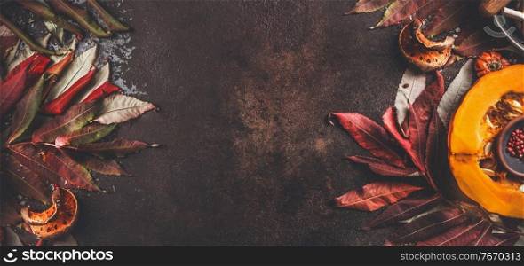 Autumn border background with half pumpkin and fall leaves. Top view. Frame
