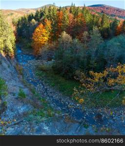 Autumn Carpathian Mountains landscape and river Bystrytsia of Solotvyn  Guta, Ivano-Frankivsk oblast, Ukraine . View from above.