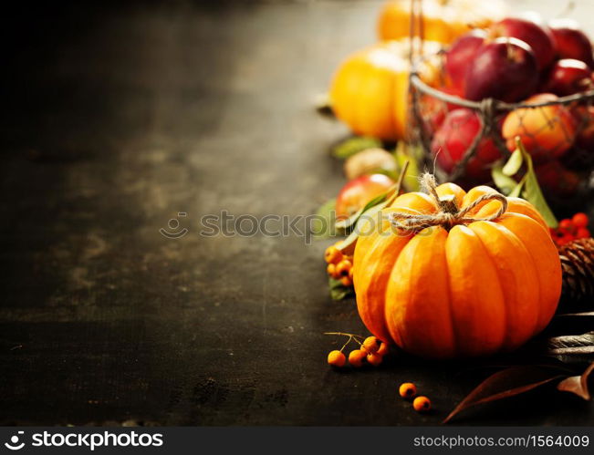 Autumn composition - apples and pumpkin on rustic background. Autumn composition - apples and pumpkin on rustic background, autumn and halloween concept