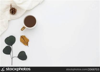 Autumn composition, coffee cup. dried leaves. and pine cones on white background. Flat lay, top view with copy space