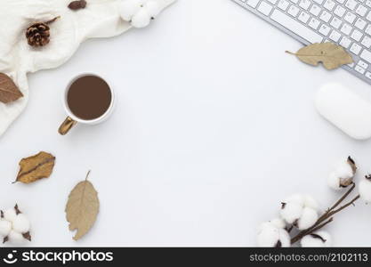 Autumn composition, office supplies, coffee cup. dried leaves. and pine cones on white background. Flat lay, top view with copy space