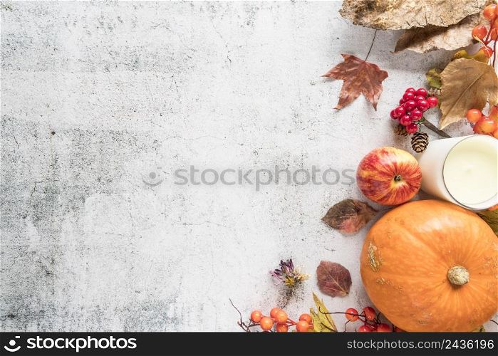 autumn composition with leaves light surface