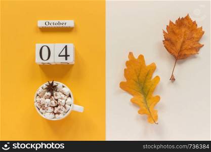 Autumn composition. Wooden calendar October 4, cup of cocoa with marshmallows and yellow autumn leaves on yellow beige background. Top view Flat lay Mockup Concept Hello September.. Autumn composition. Wooden calendar October 4, cup of cocoa with marshmallows and yellow autumn leaves on yellow beige background. Top view Flat lay Mockup Concept Hello September