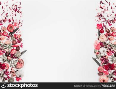 Autumn creative frame composition with fall arrangement of leaves, flowers, little pumpkins, nuts and decoration on white desk background. Top view. Flat lay. Pattern. Copy space for your design