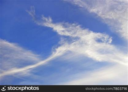 Autumn elongated stratospheric clouds against a blue sky