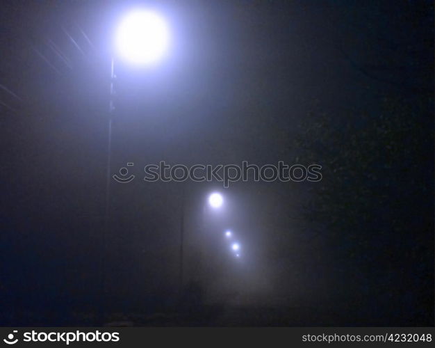 Autumn evening and street lamps