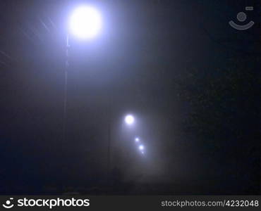 Autumn evening and street lamps