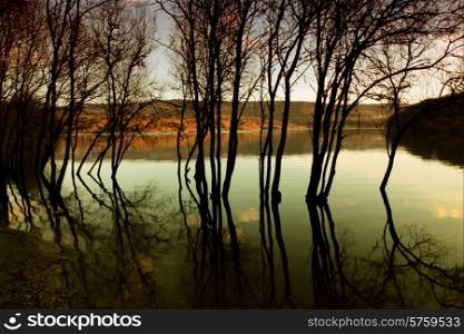 autumn flood at the lake at sunset, north of spain
