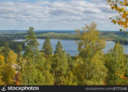 Autumn forest on the lake Arakul. South Ural