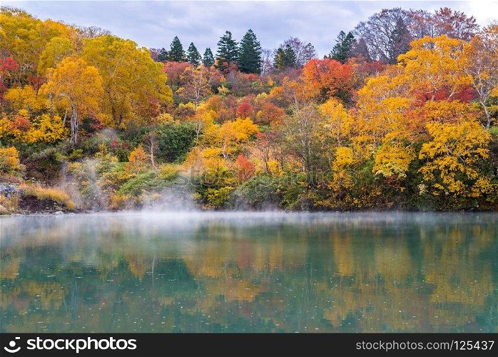 Autumn Forest onsen lake at Jigoku Numa, Hakkoda Aomori Tohoku Japan