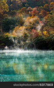 Autumn Forest onsen lake at Jigoku Numa, Hakkoda Aomori Tohoku Japan