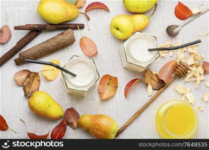 Autumn fruit drink.Pear and ginger smoothie.Flat lay. Fruit juice or smoothie with pear