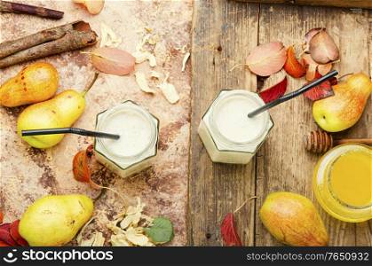 Autumn fruit drink.Pear and ginger smoothie.Healthy fruit juice and ingredient. Pear smoothie with ginger