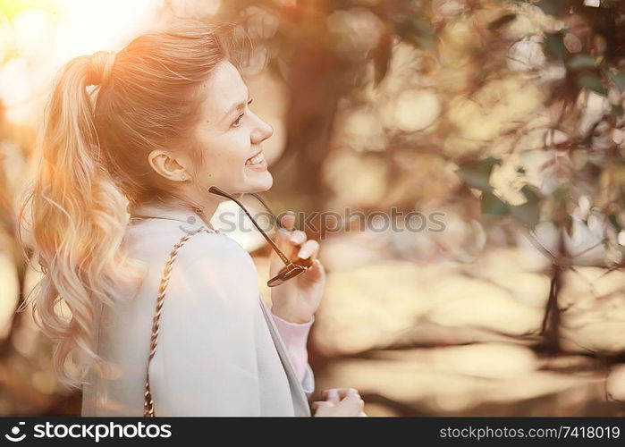 autumn girl / portrait of a girl in an autumn city park, walk happy weekend female portrait