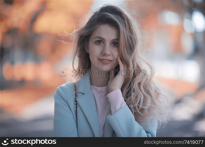 autumn girl / portrait of a girl in an autumn city park, walk happy weekend female portrait