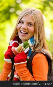 Autumn happy girl fall smiling teenager colorful scarf