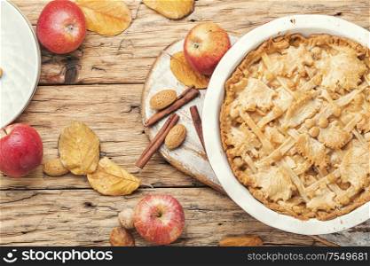 Autumn homemade pie with ripe apples.American apple dessert. Traditional american apple pie.