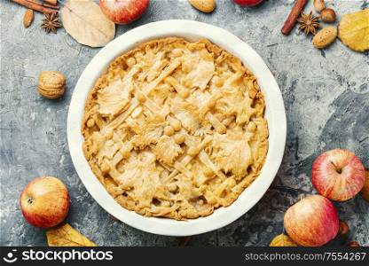 Autumn homemade pie with ripe apples.American pie.. Traditional apple pie.