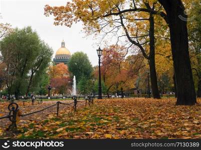 Autumn landscape, Park paths covered with fallen leaves. St. Petersburg&rsquo;s Alexandrovsky Park.. Autumn landscape, Park paths covered with fallen leaves.
