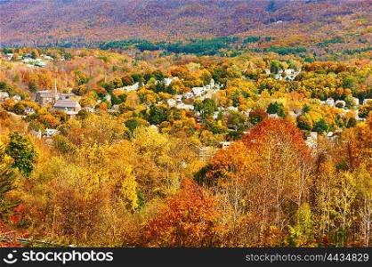 Autumn landscape with small town in New England