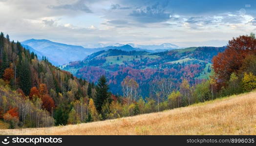 Autumn misty morning mountain panorama with haystack in front (Carpathian Mt&rsquo;s, Ukraine). Two shots stitch image.