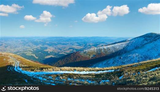 Autumn  mountain panorama with first winter snow (Carpathian, Ukraine).