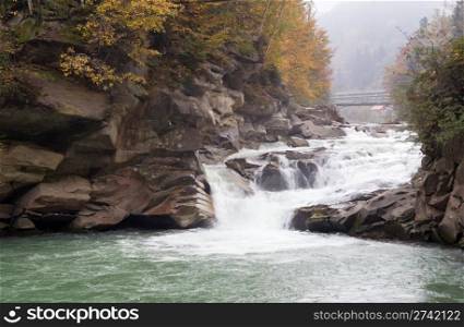 Autumn mountain river viev (with waterfall and bridge)