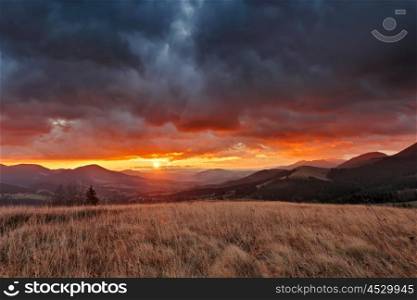 Autumn November cloudy sunrise in Carpathian mountains