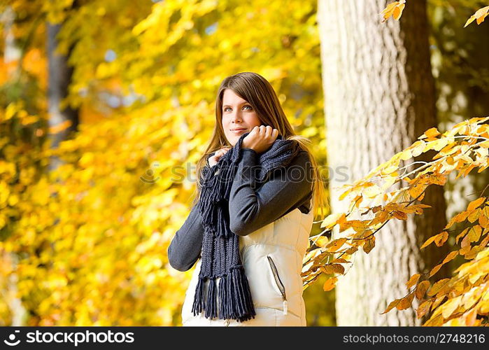 Autumn park - fashion model woman on sunny day