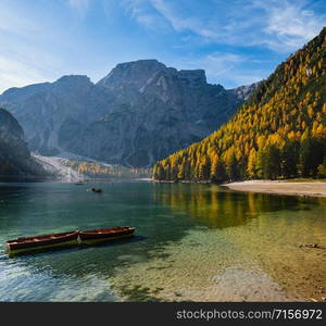 Autumn peaceful alpine lake Braies or Pragser Wildsee. Fanes-Sennes-Prags national park, South Tyrol, Dolomites Alps, Italy, Europe. People are unrecognizable.