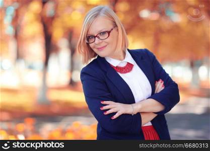 Autumn portrait of a business woman in the street