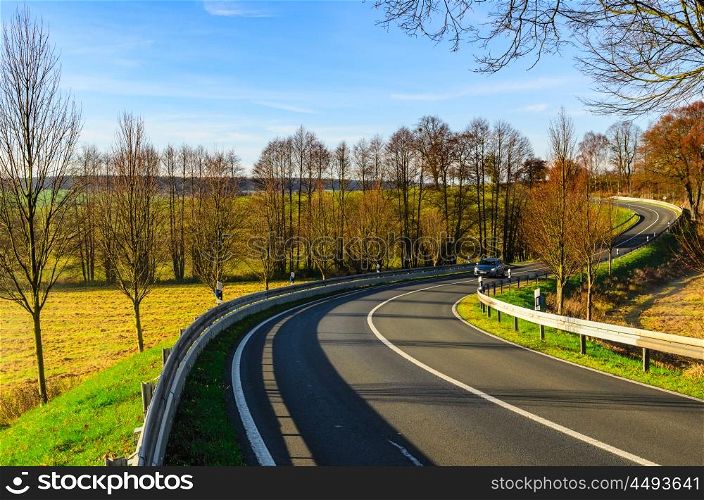 autumn road scene. autumn road at sunny day in Germany
