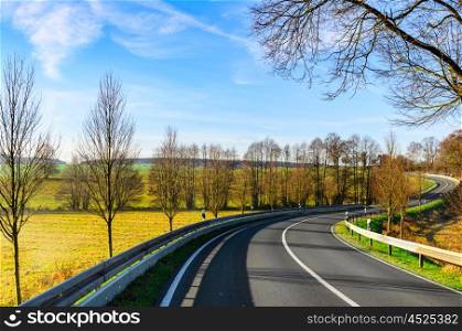 autumn road scene. autumn road at sunny day in Germany