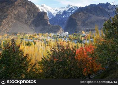 Autumn scene in Karimabad with mountains in the background. Hunza valley, Pakistan.